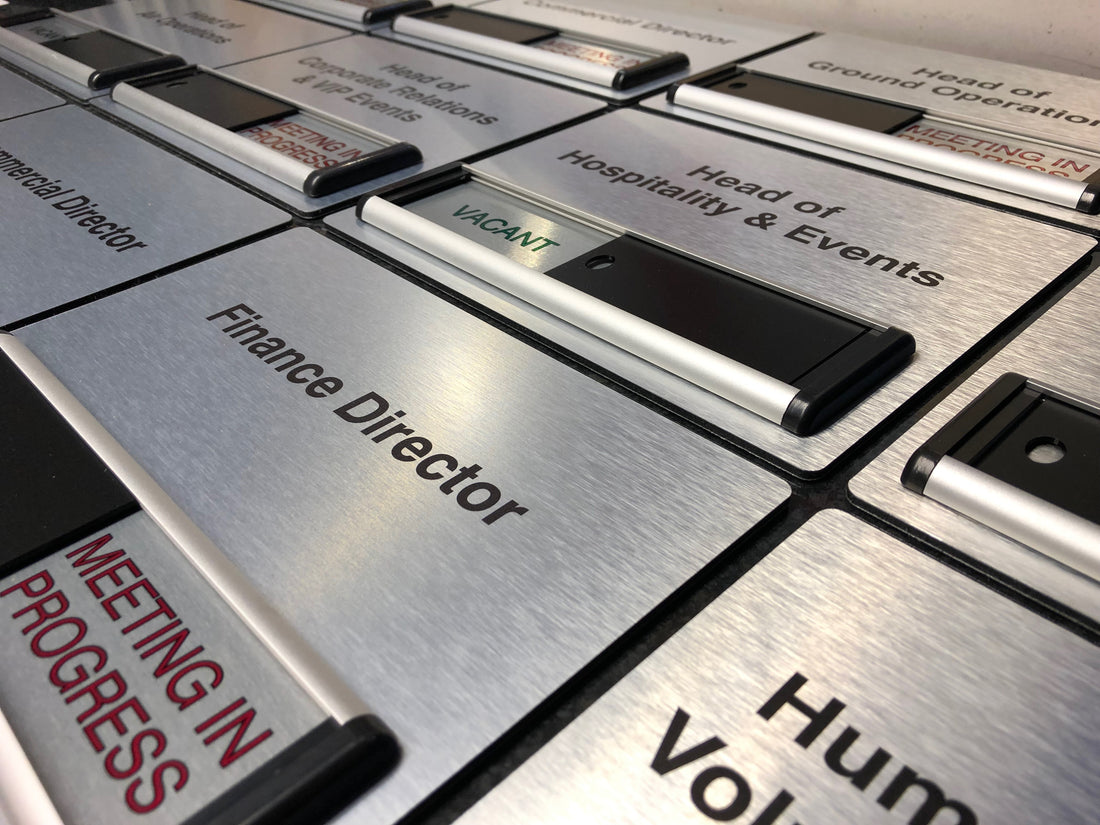 Brushed Silver Sliding Signs with Header Panels for The Royal Air Force Charitable Trust Enterprises